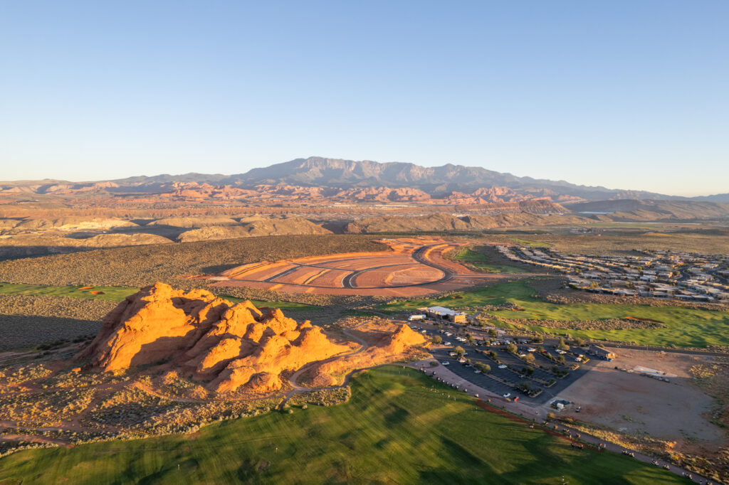 Aerial view of The Estates with red rocks formations